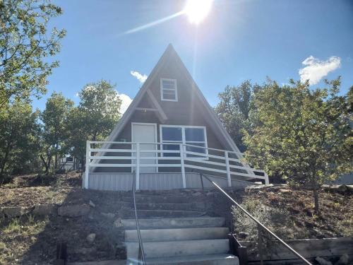 Cisco Ski Chalet | Charming Lakeside Cabin with Fire Pit & Private Dock Near Lake Cisco, Cisco, TX