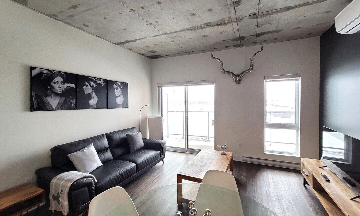 Fabreville Apartment | Corporate Stays -Relax & unwind with 1BR exclusive amenities with Rooftop Access