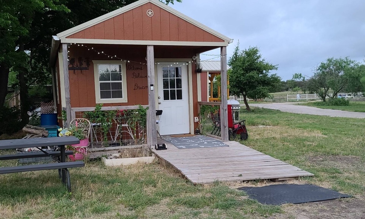 Kempner Cabin | Cozy Tiny Cabin with a small porch and firepit.