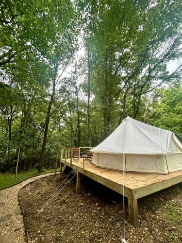 Gentry Other | Enchanting Mountain Glamping Tents with Elevated Decks and Fire Pit Near Gentry, AR