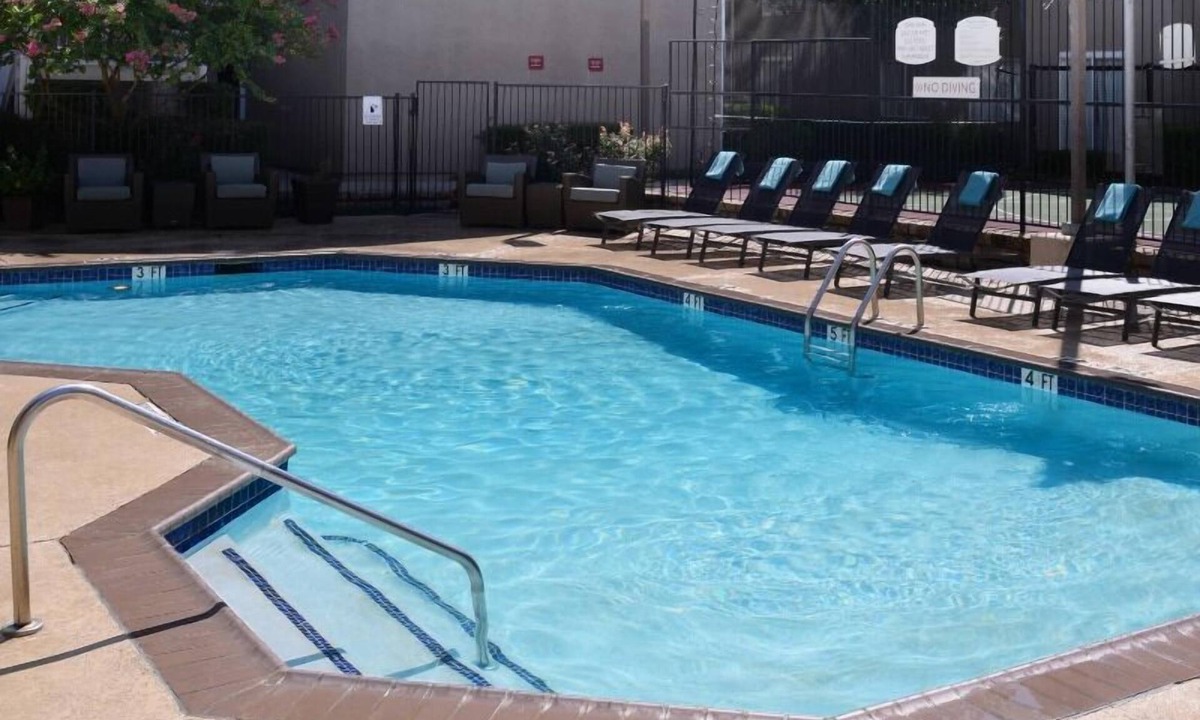Dallas Apartment | Experience North Dallas' Best! Fully-Equipped Kitchen, Free Breakfast, Pool