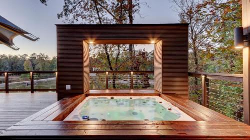 Mid America Other | Hot Springs Getaway: Fully Equipped Tented Cabin with Nature's Embrace and Private Hot Tub