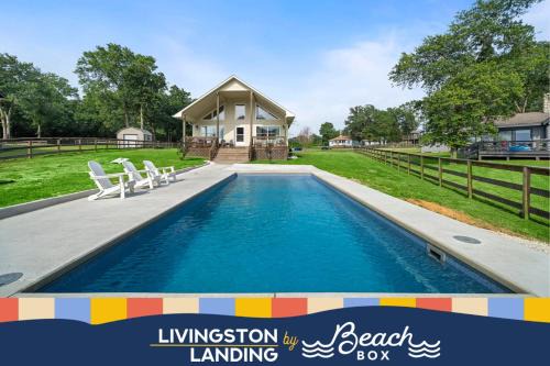 West Livingston House | Lakefront home with huge yard and picturesque front Porch