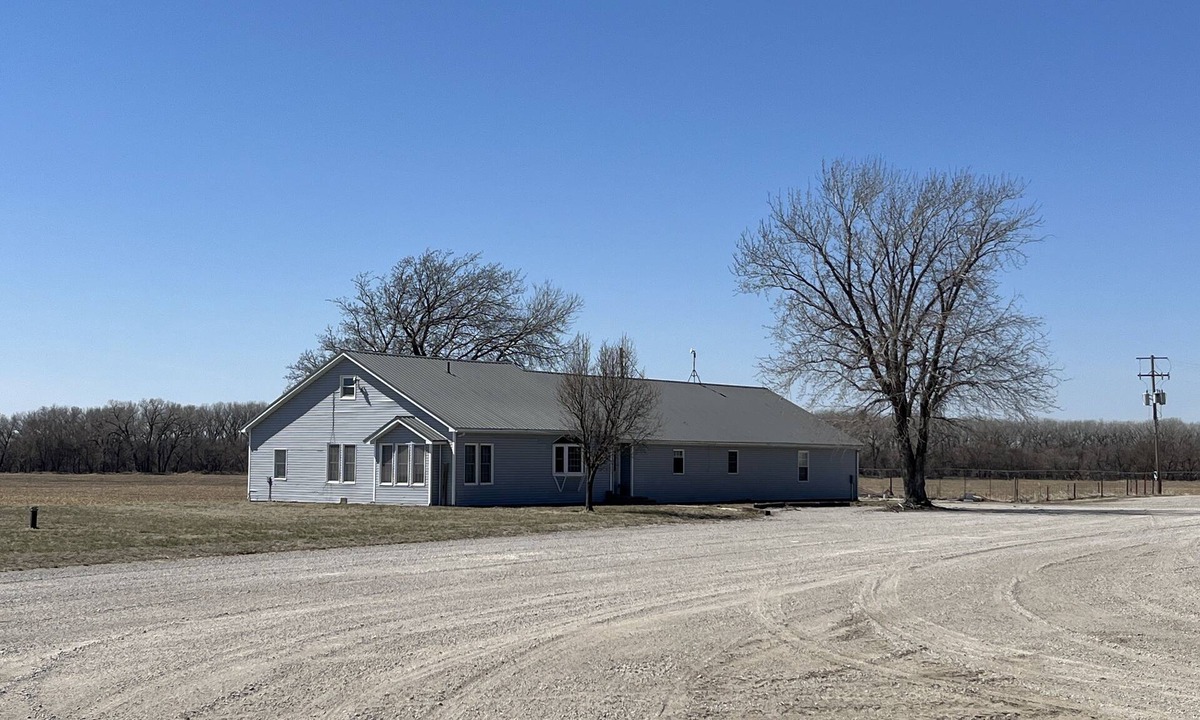 Republic County House | Large house surrounded by farm land along the Republican River.