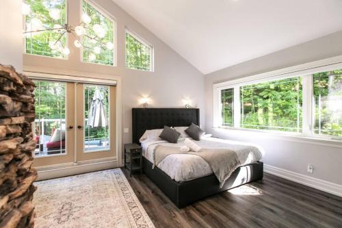 Caledon House | Luxury 4BR Stay with Swim Spa, Golf and Fireplaces