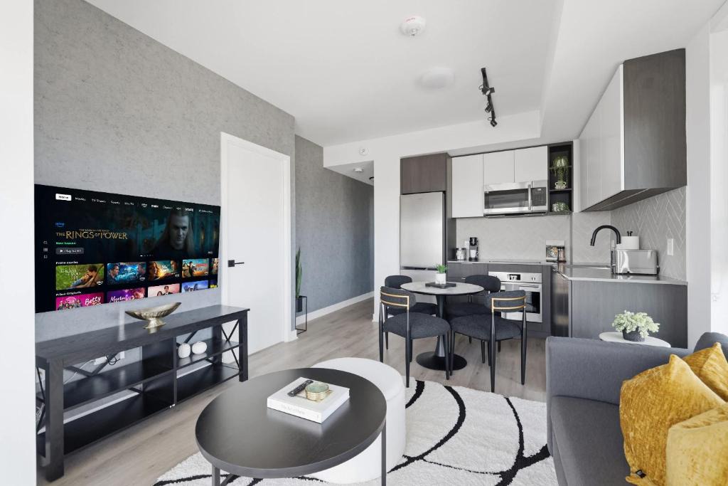The Queensway Apartment | Modern 2BR Retreat with Private Balcony & Parking