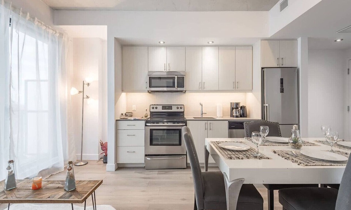 Cite Multimedia Apartment | Modern Industrial 1BR + Balcony in Old Montreal