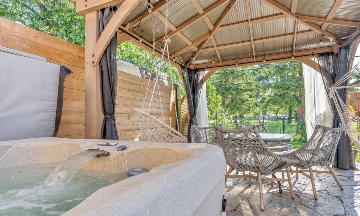 Riverside House | Park View Retreat with Hot Tub and King Size Bed