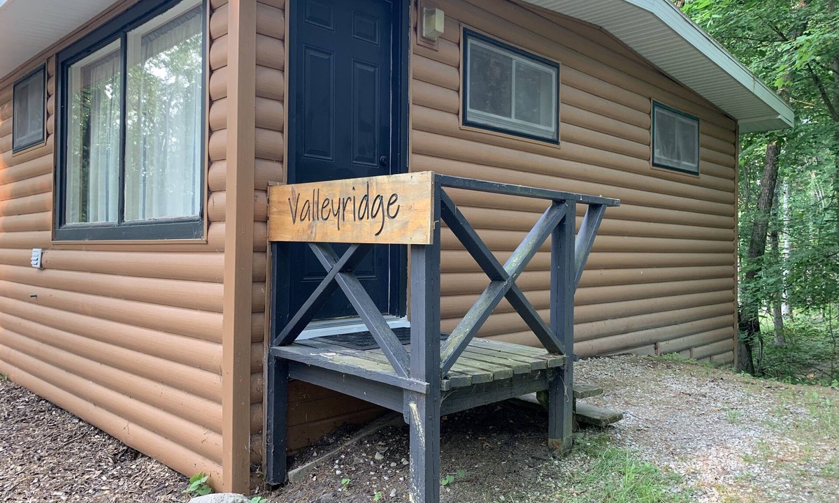 Palmyra Cabin | Rustic cabins in secluded campground with lake access and woods to wander in.