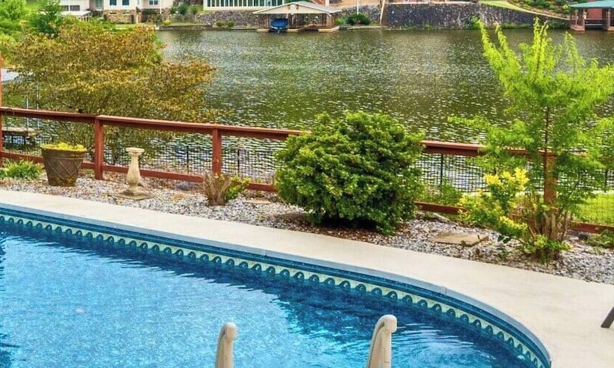 Mid America House | Serene Lakefront Escape with Pool & Hot Tub
