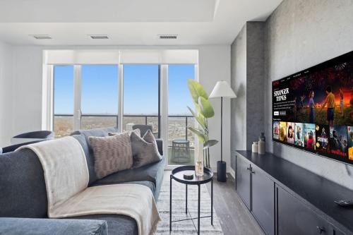 Islington - City Centre West Apartment | Sleek 2BR Condo with Private Patio & Parking