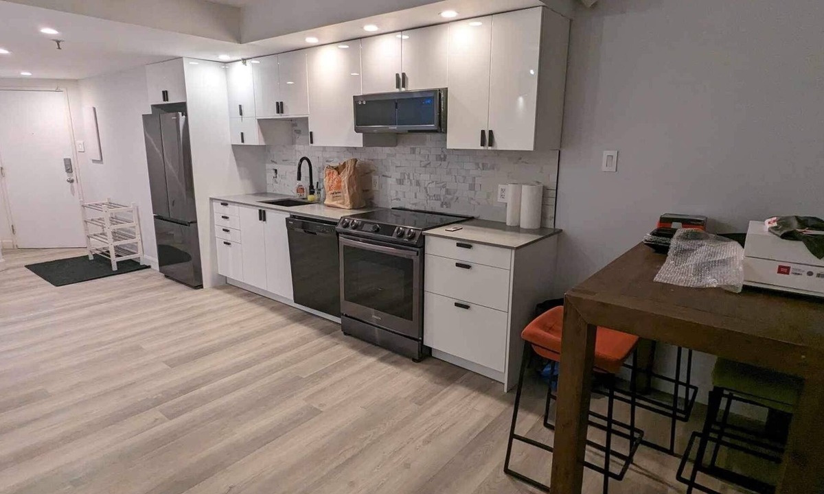 Shaughnessy Village Apartment | Sunny Downtown Montreal skyline view Crescent + Bell Centre 1 Br condo