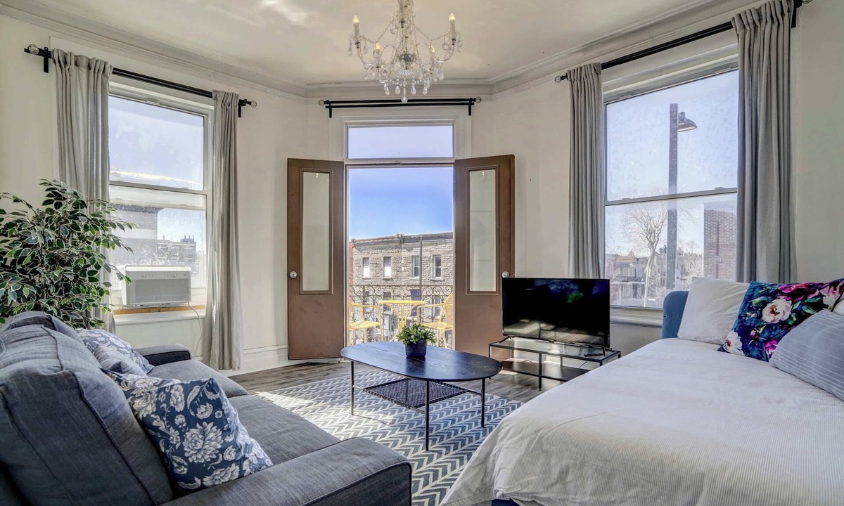 Plateau Mont Royal Apartment | Top-Floor Balcony Overlooking Mont-Royal Ave Cafés