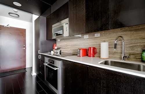CityPlace Condo | 2BD 1 Bath 4 Guests Parking Balcony Near CN Tower Downtown—By Hostia