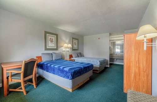 Livingston Hotel | 3 Practical and Clean Rooms w/2 Full Beds Travel-Friendly Amenities for Guest