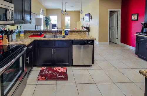 McAllen House | 4BR Smart Luxe Condo w/Pool View, Gated Community: close to Costco & Top Golf