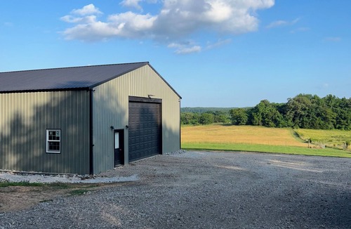 Poughkeepsie House | 5 BR Strawberry River retreat with huge sandbar, float access, & 37 scenic acres