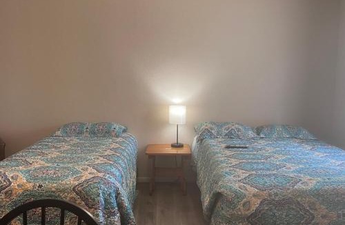 Hemphill Hotel | Alpine Lakeside Motel Room Backside