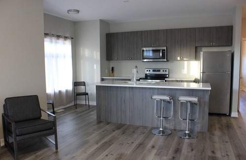 Highland West House | Boardwalk Homes - Executive Guest Rooms & Townhomes