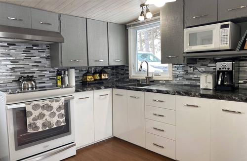 Sainte-Clotilde-de-Horton Ski Chalet | Chalet by the river - Nature, paddle, campfire and water view