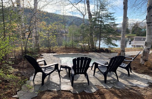 Mandeville Ski Chalet | Chalet l'Oasis with private lakeside beach and in-ground spa