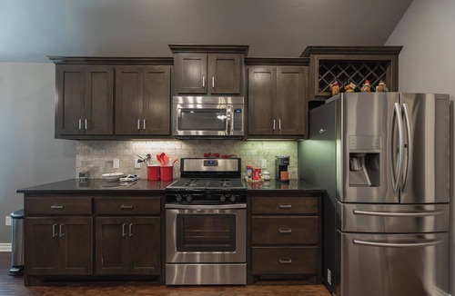 Oklahoma City House | Charming 3-bedroom house in Yukon with indoor fire place