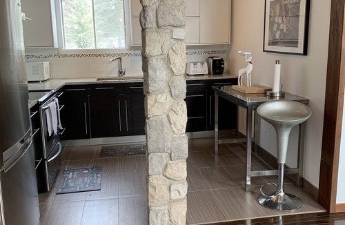Riviere-Rouge Ski Chalet | Charming Waterfront Cottage 35 minutes from Mont-Tremblant