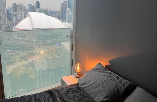 Toronto Entertainment District Apartment | Chic 2 Bedroom 2 Bathroom Panoramic CN Tower Views Condo With Free Parking