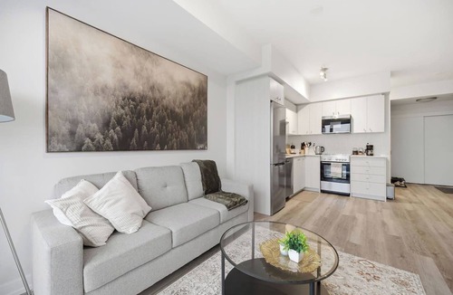 Kitchener Apartment | Contemporary Condo in DTK | Gym, Pool, & More