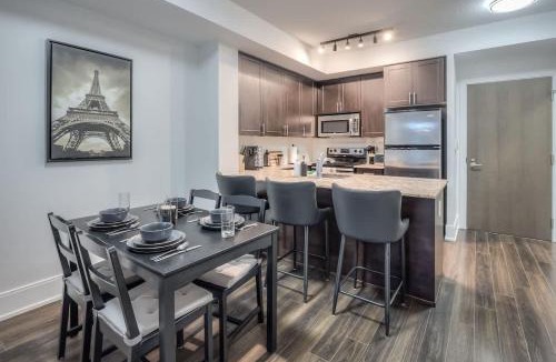 Wellington Place Apartment | Cozy 1BR Downtown Stay with Balcony Views