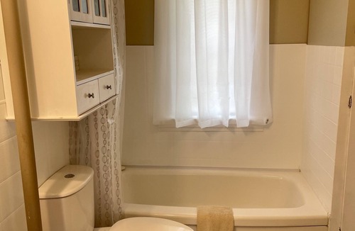 Rosthern Cottage | Cozy Creekside cottage offering a quiet rural prairie town experience