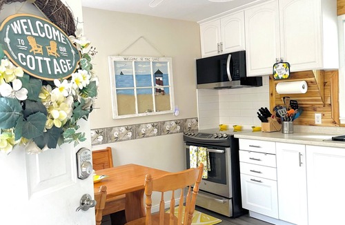 Plympton-Wyoming Cottage | Cozy Riverfront A-Frame. Paddle from the Backyard or Walk in mins to Lake Huron