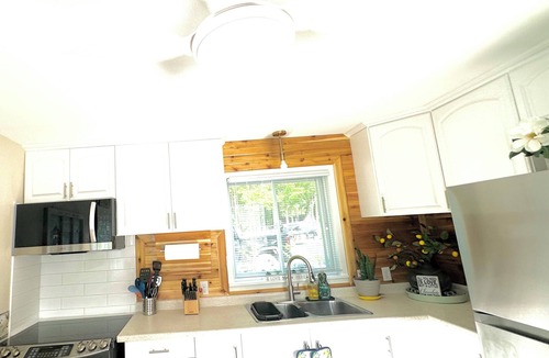 Plympton-Wyoming Cottage | Cozy Riverfront A-Frame. Paddle from the Backyard or Walk in mins to Lake Huron