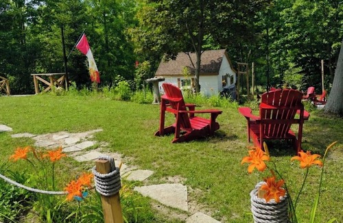 Plympton-Wyoming Cottage | Cozy Riverfront A-Frame. Paddle from the Backyard or Walk in mins to Lake Huron