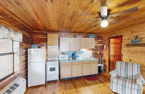 Mountain Pine Condo | Cozy riverfront condo with river access for swimming, boating & fishing