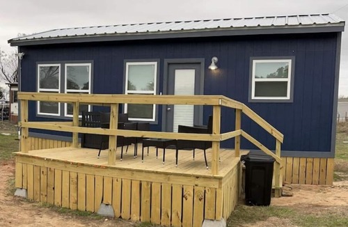 Brenham House | Cozy tiny house on a farm with a large deck to watch the sunrise and sunset.!