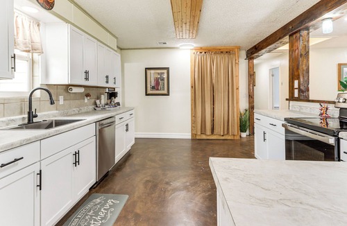 Grove House | Deck & Yard: Wolf Creek Waterfront Home in Grove!