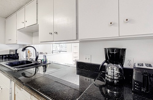 Northwest Hills House | Delightful getaway with wood fireplace, fenced yard, AC, & W/D