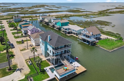 Jamaica Beach House | Dreams Float! - Expansive Decks, Pool, Elev, 2 Masters - Canal w Epic Views