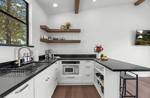Waller Cabin | Elegant Tiny Home Resort with Heated Pool & Goats near Houston, Hempstead Texas