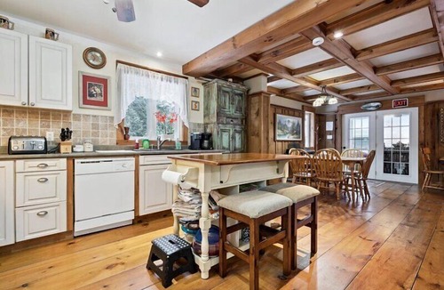 Northern Bruce Peninsula House | Escape to Three Bears Cottage, a cozy cedar-lined cottage just two blocks from Lake Huron. Enjoy evenings by the fireplace, mornings on the wrap-around porch, and peaceful moments surrounded by nature on the beautiful Bruce Peninsula.