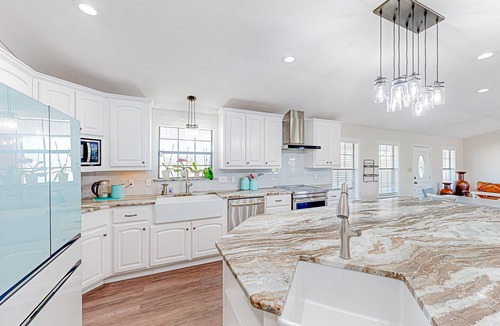 Cameron House | Expansive property with pond, pool, fireplace & pool table - dog-friendly