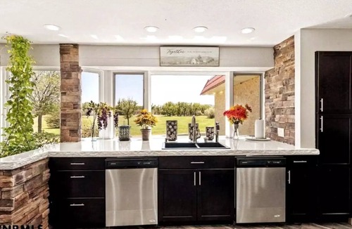 Scottsbluff House | Experience Scottsbluff charm in our spacious 4-bedroom retreat