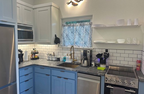 Sylvan Shores Cabin | Firefly1 - luxury treehouse, hot tub, lake access, ample parking, full kitchen
