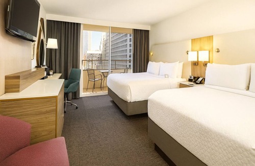 Downtown Dallas Hotel | Four Units | Breakfast Included | Outdoor Pool Access