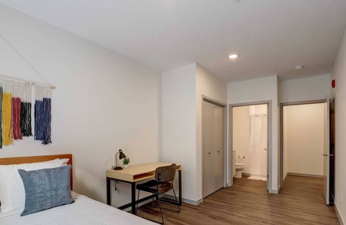 Downtown Lincoln Apartment | Frontdesk | 4 BR Apt by Nebraska History Museum