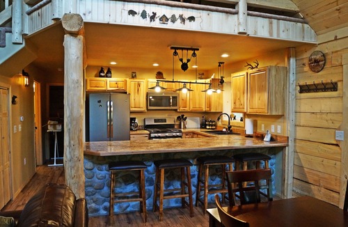 Sutton-Alpine Cabin | Gorgeous Log Cabin With Huge Wraparound Porch
