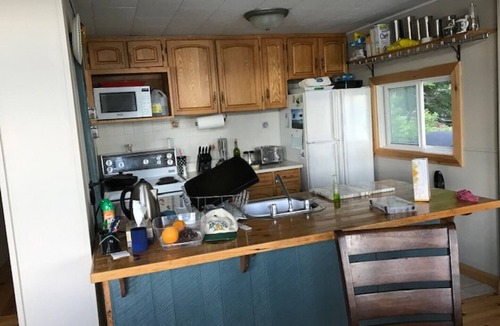 Machar Cottage | gorgeous view, steps to lake, 2 canoes and paddle boat