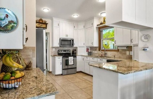 Granbury House | Granbury Lakeside Home with Pool, Game Room, Fire Table