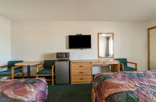 Texhoma Hotel | Inviting Two-Queen Room Conveniently Close to Dining Spots